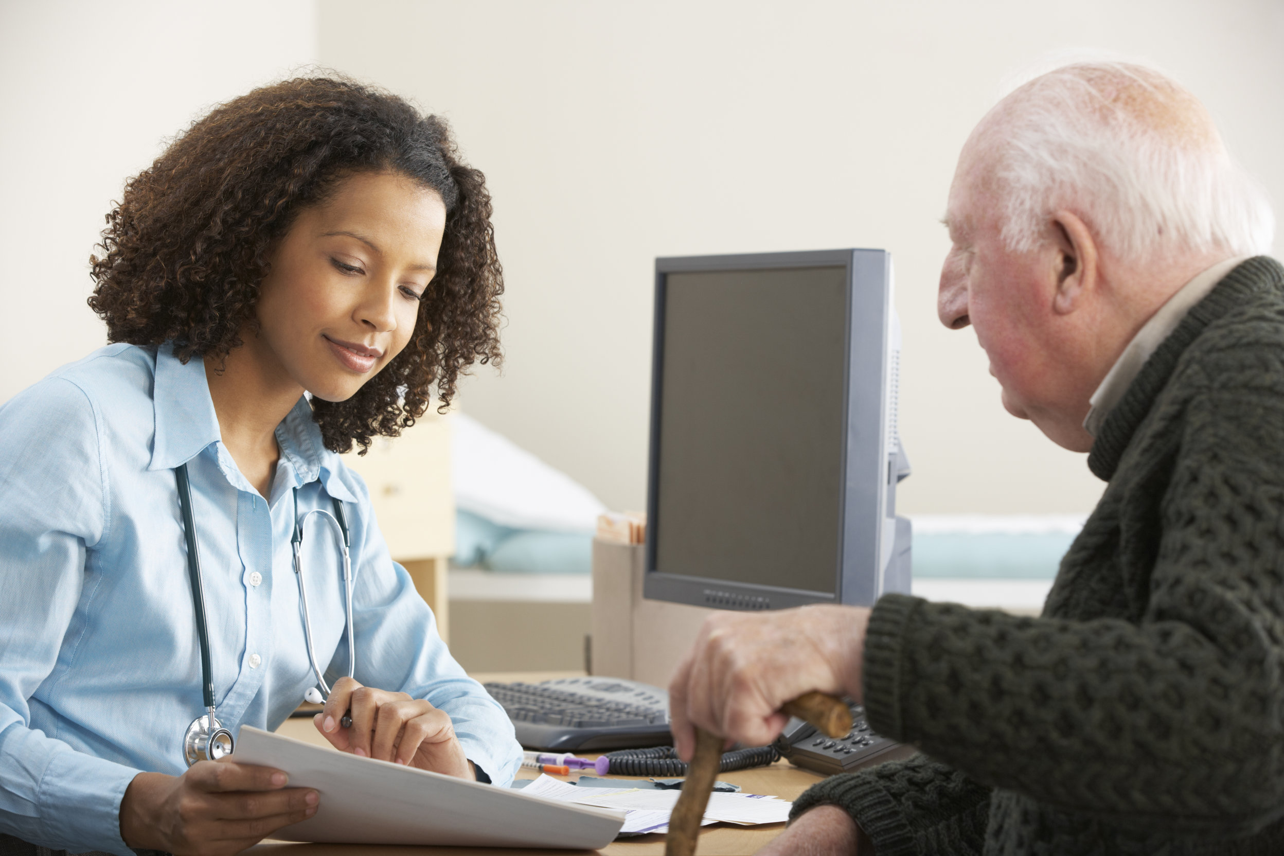 Female physician discussing diabetes with a patient