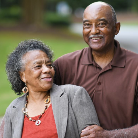 older adult couple smiling